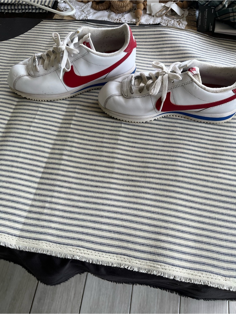 Nike White Sneakers with Red Swoosh and Blue Accent